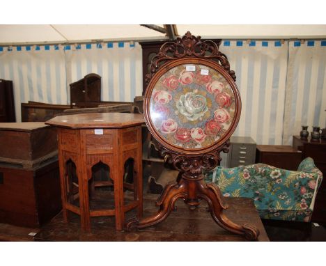 A VICTORIAN CARVED WALNUT POLESCREEN with carved crest, tapestry and beadwork inset floral panel, turned column support and t
