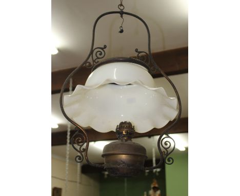 A 19TH CENTURY HANGING OIL LANTERN with a large white glass shade, 42cm diameter together with a five branch brass hanging ch