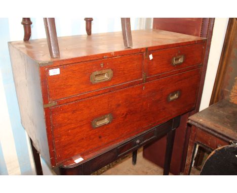THE TOP HALF OF A TEAK CAMPAIGN CHEST OF DRAWERS with brass mounts and inset handles, consisting of two short and one long dr