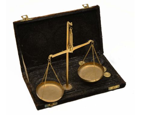 A SMALL SET OF BRASS SCALES with weights in a fitted case