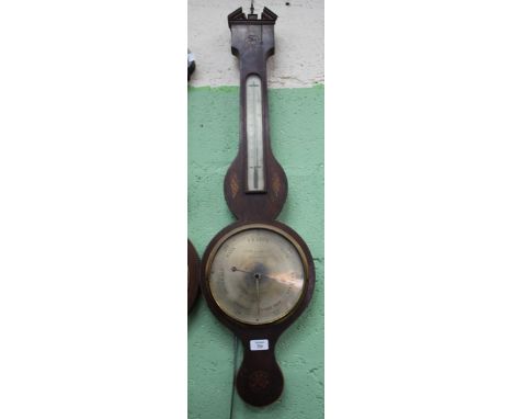 A 19TH CENTURY MAHOGANY CASED DIAL BAROMETER with break pediment, thermometer and silvered dial, the case with decorative inl
