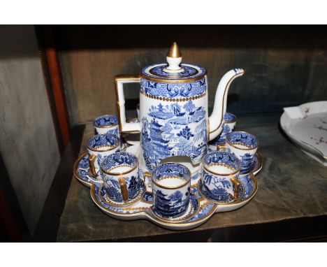 A MID TO LATE 19TH CENTURY DAVENPORT BLUE AND WHITE TRANSFER PRINTED COFFEE SET consisting of nine cups and saucers and coffe