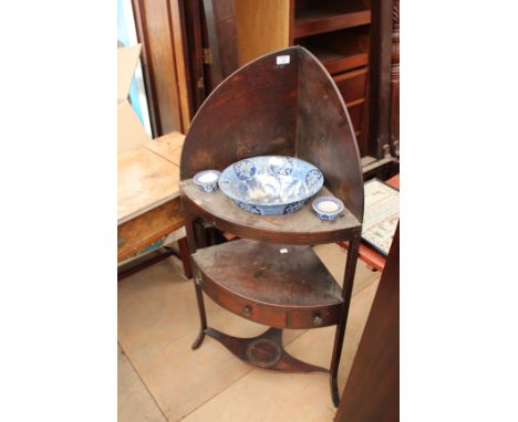 A GEORGIAN MAHOGANY CORNER WASHSTAND with raised back and central tier with drawer and square tapering legs, united by an und