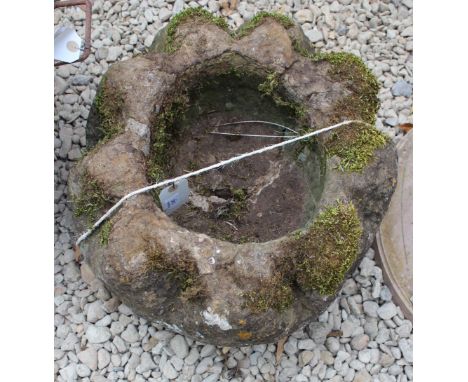 A SMALL CARVED STONE CIRCULAR TROUGH, 44cm diameter