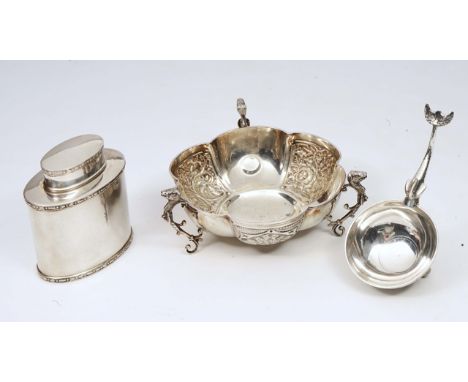 A SCOTTISH SILVER CIRCULAR BOWL with dolphin handle and marks for Brook & Son, Edinburgh, 12.5cm long together with a silver 