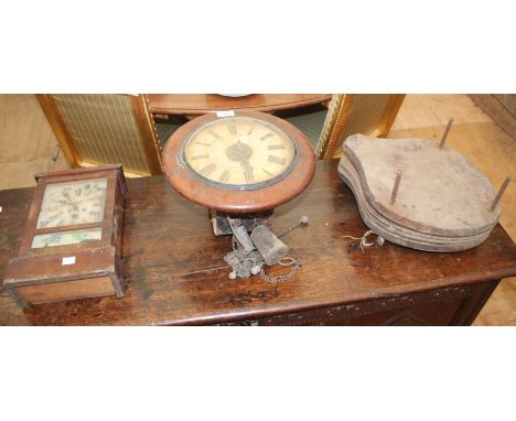 A 19TH CENTURY GERMAN MAHOGANY POSTMANS ALARM WALL CLOCK together with an American 19th century mantle clock and a 19th centu