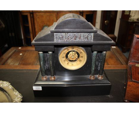 A 19TH CENTURY SLATE CASED PORTICO MANTEL CLOCK, the gilt chapter ring with black Roman numerals, the movement marked 'Medail