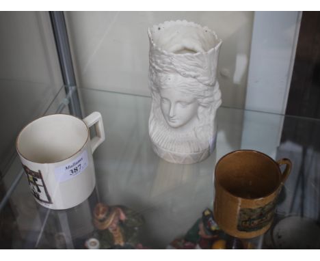 A GOSS PORCELAIN MUG depicting the 'Pillory' Rye, a Goss cottage pottery cylindrical mug and a Goss bisque porcelain vase (3)