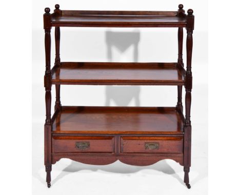 A VICTORIAN MAHOGANY THREE TIER BUFFET with turned column supports, two drawers to the base and standing on turned legs and c