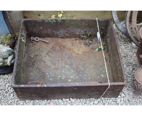 AN OLD CAST IRON RECTANGULAR WATER TROUGH, 73cm wide x 23cm high