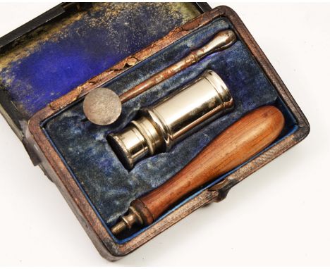 A MID 19TH CENTURY MAW LONDON CAUTERY SET consisting of a two piece tool and burner and all housed within a leather fitted ca