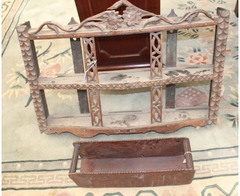 AN ANTIQUE CARVED FRUITWOOD TWO TIER WALL SHELF, 77cm wide together with an antique oak small wall shelf with fluted supports
