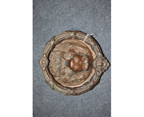 A LARGE CIRCULAR BRASS DOOR KNOCKER with lion mask, 22cm diameter, possibly originally retailed by Beardmores