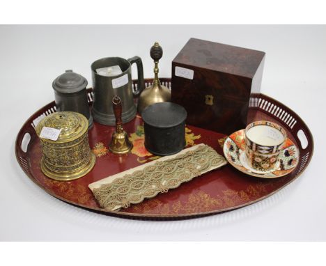 A VICTORIAN MAHOGANY BOX together with two brass table bells, two pewter tankards, a Victorian brass string box, an oval tray