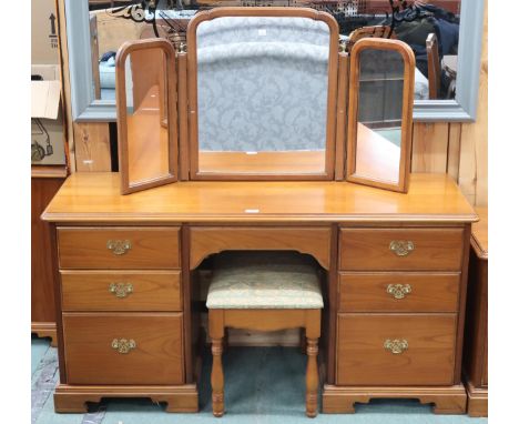 A contemporary Youngerdressing table with triple plate dressing mirror on twin pedestal dressing table with central frieze dr