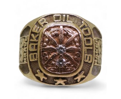 A 10k gold cTo brand American style college ring, for Baker Oil Tools set with two diamonds of estimated approx 0.06cts, fing