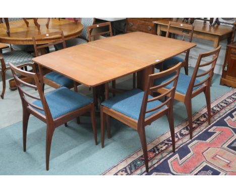 A mid 20th century teak A.H McIntosh gateleg dining table and six chairs, table, 73cm high x 150cm long x 92cm deep and chair