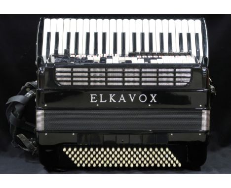 An Elkavox 83 120 bass 41 key piano accordion with case Condition Report:The instrument is second hand. It is in overall good