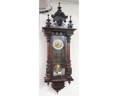 A 20th century after Gustav Becker, Austrian style wall clock with dial bearing Roman numerals, 120cm high x 42cm wide x 21cm