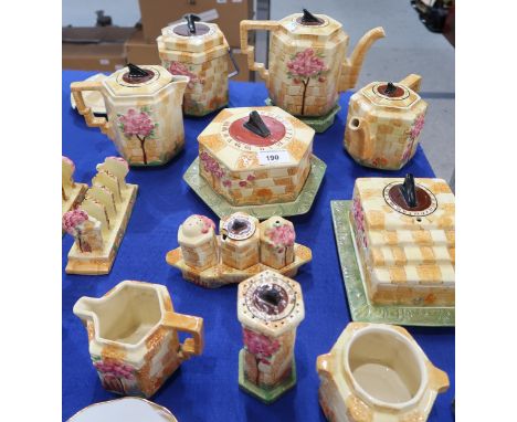 A collection of Beswick Sundial table wares including teapot, coffee pot, hot water pot, biscuit barrel, butter dish, cheese 