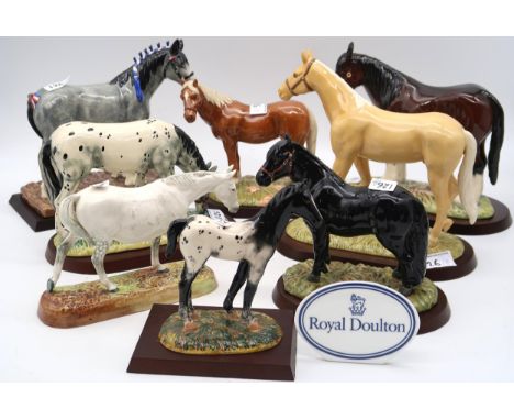 A collection of Royal Doulton horses including Gude Grey Mare HN2569, Shire, Appaloosa and Foal, Palomino, Shetland Pony, Cly