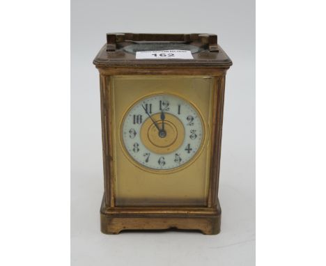 A French brass and glass carriage clock Condition Report:Available upon request