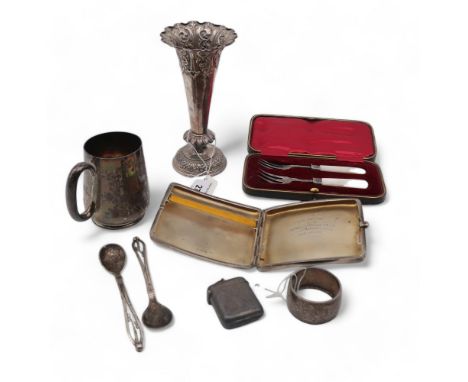 A collection of silver including a pair of Georg Jensen spoons, a silver christening mug by Martin Hall &amp; Co, with engrav