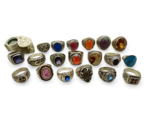 A collection of silver and white metal gem set rings to include ruby-zoisite, agate, turquoise, opal etc Condition Report:No 