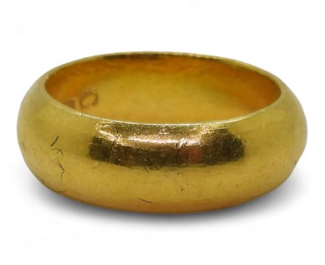 A Chinese gold ring, stamped with Chinese characters and 965%, size Q, weight 15.2gms Condition Report:Available upon request