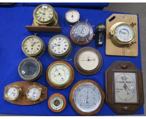 Three brass ship's bulkhead clocks, to include a Smiths Empire example; a WW2 Type P4A aircraft compass, No 11361 T; a Suunto