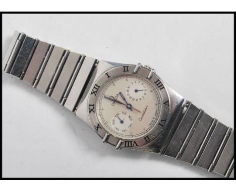 An Omega Constellation gentleman's wristwatch ( watch )&nbsp; having&nbsp; a silvered circular dial with subsidiary date and 