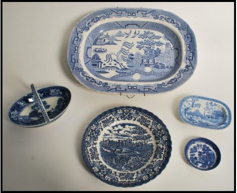 A group of blue and white ceramics dating from the early 19th century to include Spode Tiber pattern plate, Wedgwood basket, 