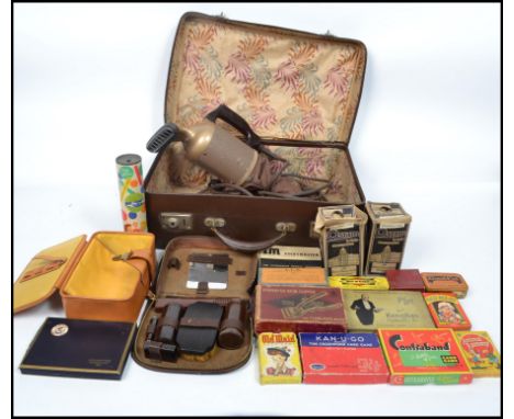 A good collection of vintage 20th century items to include various advertising tins, Osram bulbs in boxes, vintage Hoover, ge