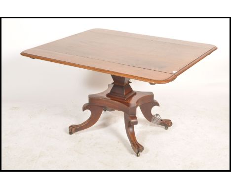 A 19th century Regency believed Scottish / Irish sofa table having clip in leaves to the rectangular top. Beneath a good balu