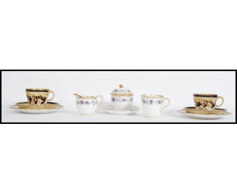 A 19th century Victorian Worcester cup saucer, lidded sugar bowl and creamer milk jug in a matching floral pattern with gilt 