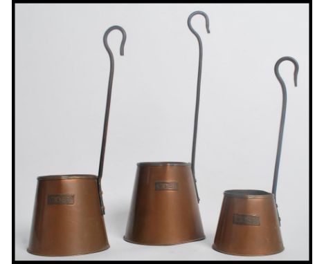 A set of 3 vintage 19th century copper and brass Cider ladles each with brass plaques having tall handles, each of graduating