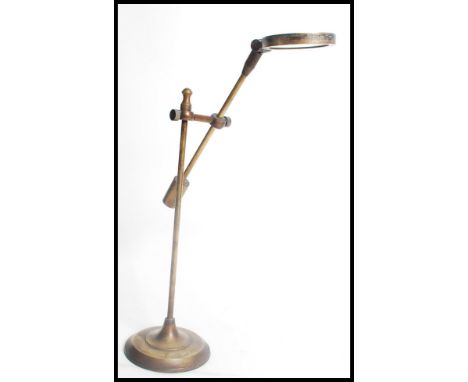 A vintage early 20th century brass shop / jewellers display counter magnifying glass. Of brass construction with terraced bas