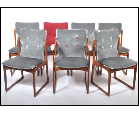 A set of 6 original mid century Danish teak wood dining chairs by Vamdrup Stolefabrik. Raised on shaped supports with low bas