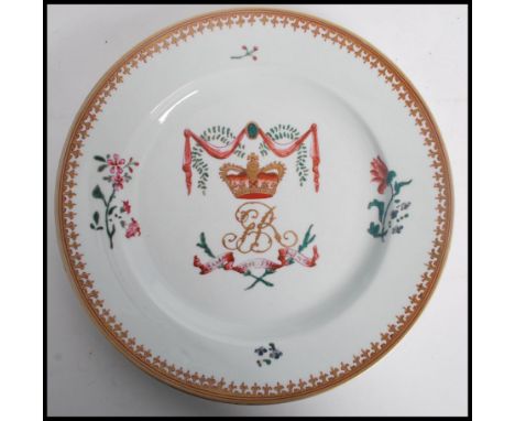 A 19th / 20th century Chinese export ceramic plate / bowl having gilt  red and green decoration depicting a commemorative arm