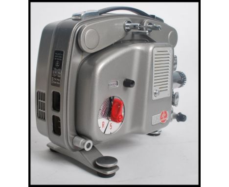 A vintage 20th century Bolex Pallard T8.5 projector complete in original box. Measures 27cms width.