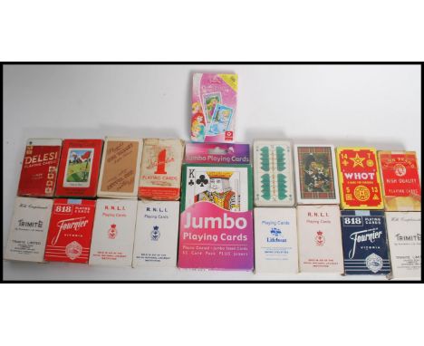 A collection of vintage and retro playing cards to include advertising packs etc please refer to images.