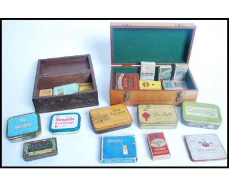 A good group of vintage 20th century cigarette tobacco smoking related boxes packets and tins to include Godfrey Phillips BDV