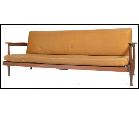 A retro mid century Guy Rogers ' Manhatten ' sofa / daybed having show wood angular teak frame with with swept arms with remo