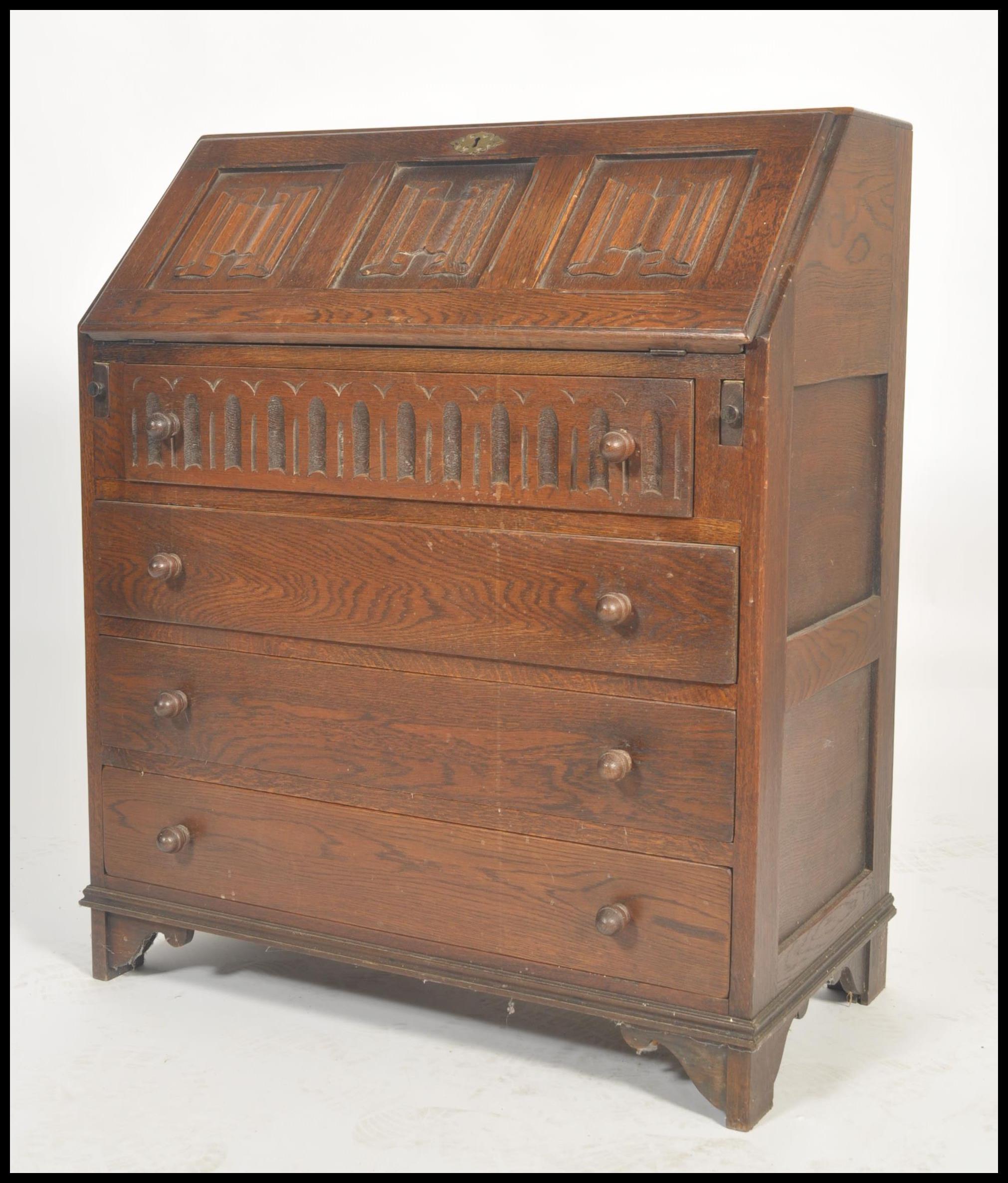 Jaycee / Old Charm oak bureau writing desk in the Jacobean revival