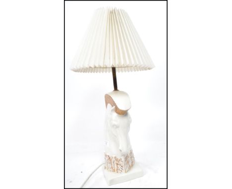 A vintage 20th century ceramic table lamp / light in the form of a horses head / Knight Chess piece with gilt detailing. Make