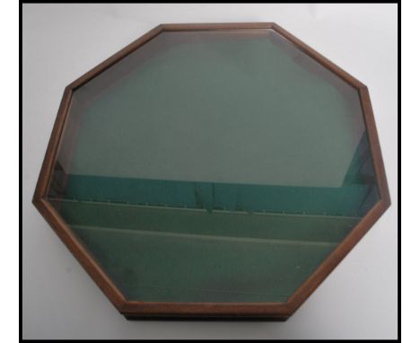 A stunning vintage 20th century metamorphic desk tidy / trinket box together with a circular oak table top glazed display uni