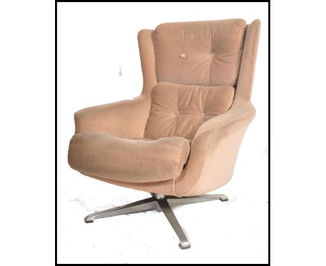 Alf svensson - A retro 1960's swivel egg type chair designed for DUX. The ' Form 7 ' chair is raised on a quadruped metal bas