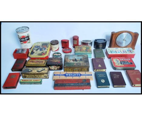 A collection of vintage tins dating from the early 20th century to include advertising point of sale, Post office saving tins