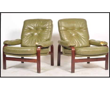 A pair of retro 20th century Scandinavian bentwood open armchairs dating to the 1970's. The&nbsp; armchairs having an open fr