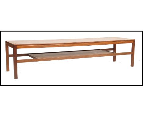 A superb mid century rectangular coffee table approx 5ft in length having reeded border and raised on squared legs having a c